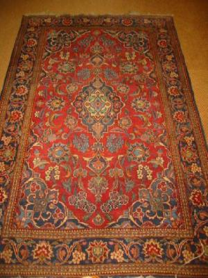 Appraisal: A PERSIAN RUG early th century the field with central