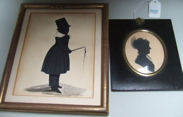 Appraisal: A black silhouette portrait of a boy wearing a hat