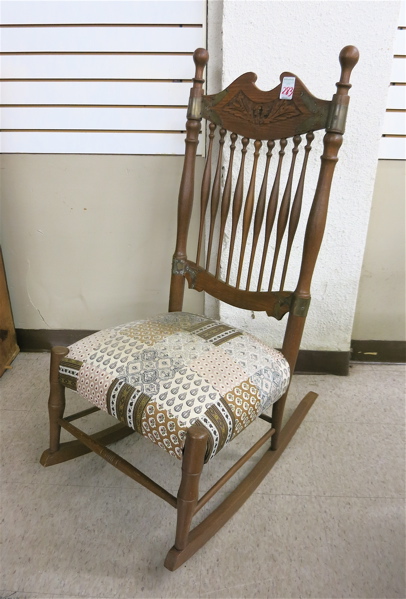 Appraisal: CARVED OAK SPINDLE-BACK ROCKER American c