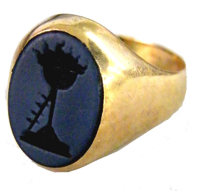 Appraisal: Late th century gold intaglio ring depicting a flaming beacon