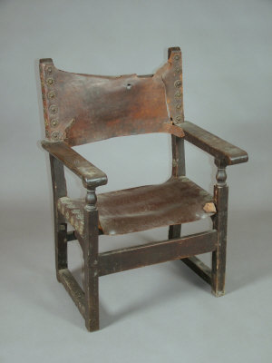 Appraisal: A mahogany and walnut throne chair th century the hide