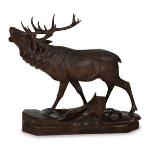 Appraisal: A Swiss Black Forest Carved Walnut Figure of an Elk