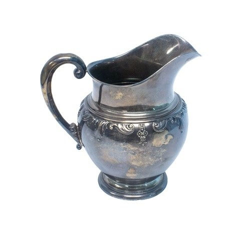 Appraisal: A Sterling silver large jug of ovoid form embossed with