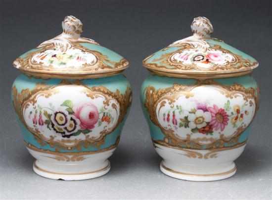 Appraisal: Pair of Porcelain de Paris floral and gilt decorated inkpots