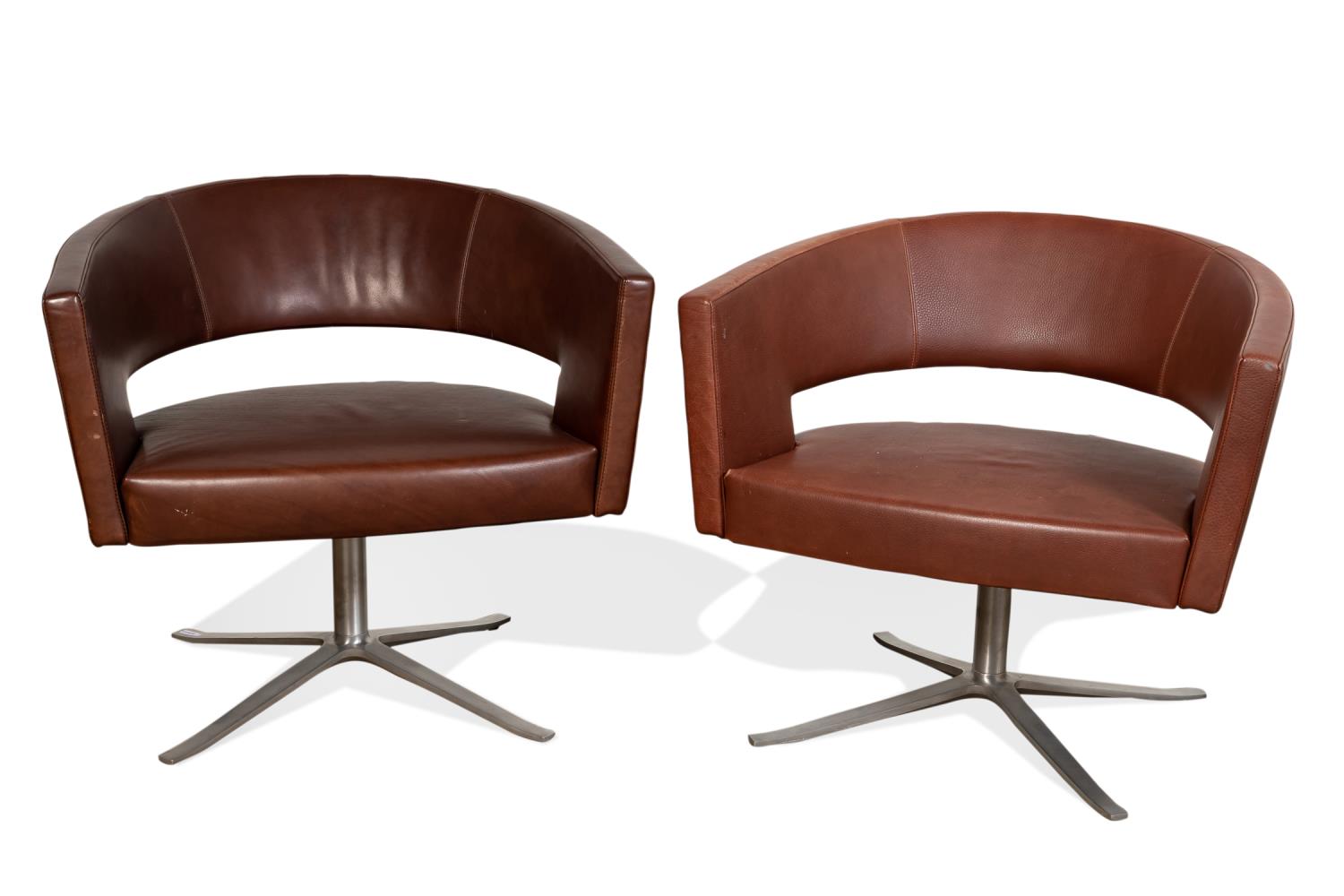 Appraisal: NEAR PAIR MONTIS TURNER LEATHER SWIVEL CHAIRS Near pair of