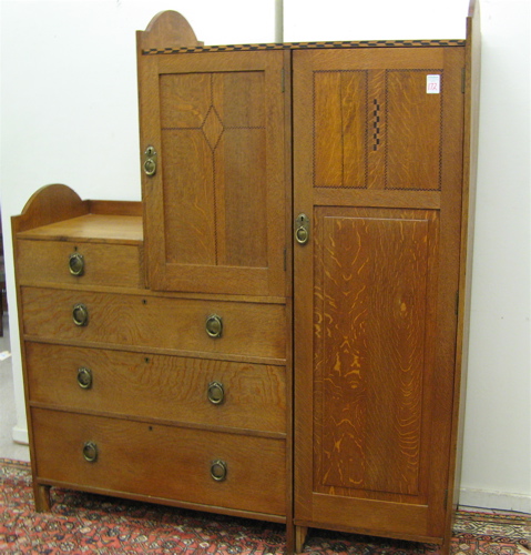 Appraisal: AN INLAID OAK CHIFFONIER English c The wardrobe dresser has