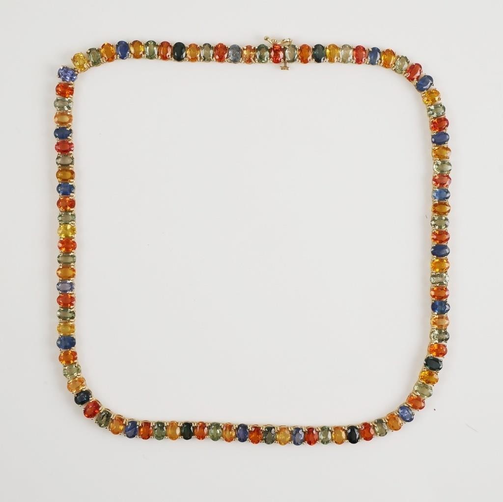 Appraisal: Rainbow sapphire oval faceted necklace in K yellow gold Necklace