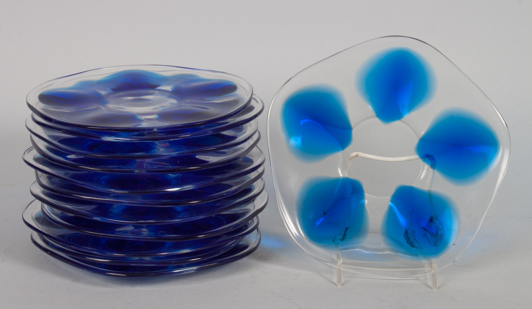 Appraisal: Lalique crystal oyster plates each shaped plate with five cobalt