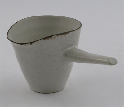 Appraisal: Lucie Rie Hans Coper a stoneware pouring vessel grey pitted