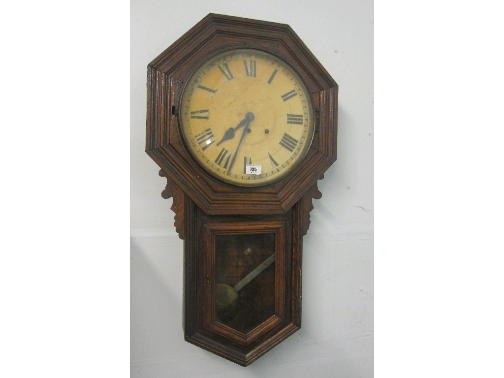 Appraisal: Oak cased wall clock