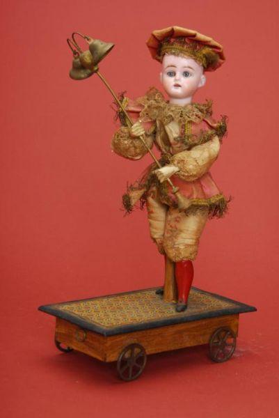 Appraisal: Zinner Bell Ringer Pull Toy Germany ca bisque flange head