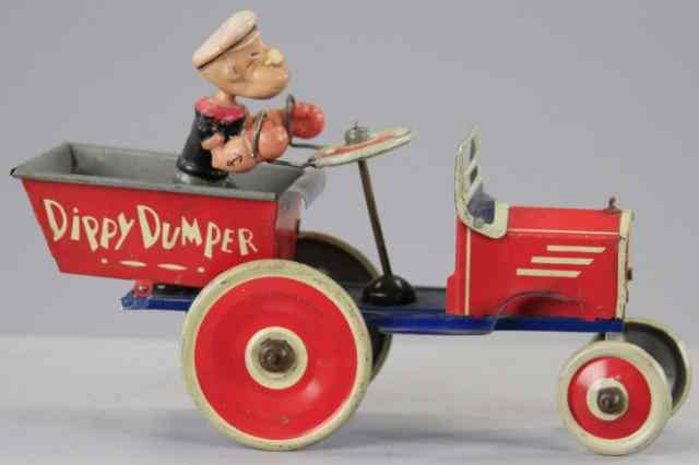 Appraisal: POPEYE DIPPY DUMPER Marx lithographed tin open dump truck features