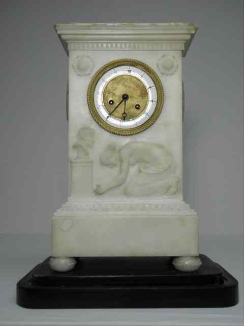 Appraisal: European white marble empire mantle clock Rectangular neo-classical case with