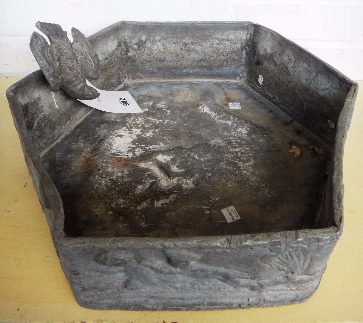 Appraisal: A cast lead hexagonal bird bath with applied bird surmount