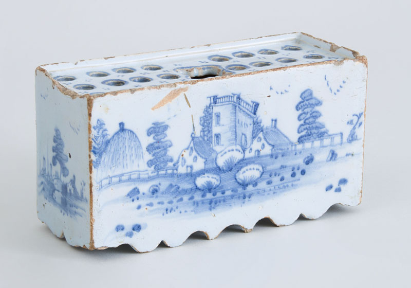 Appraisal: DUTCH DELFT BLUE AND WHITE FLOWER BRICK Unmarked with recessed