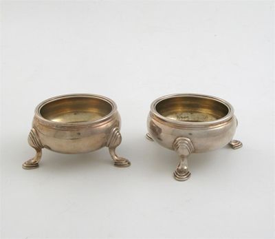 Appraisal: A pair of George II circular salts on three feet