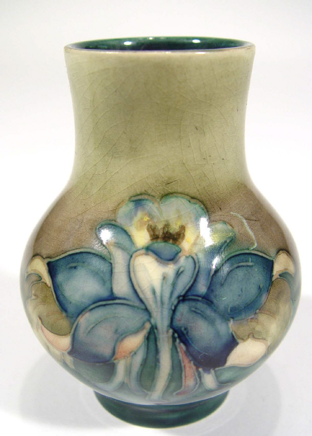 Appraisal: Miniature Moorcroft pottery vase hand painted and tubelined with orchids