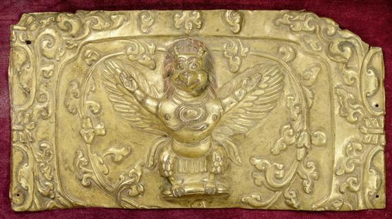 Appraisal: A FRAGMENTARY REPOUSS GILT COPPER RELIEF SHOWING GARUDA Tibet th