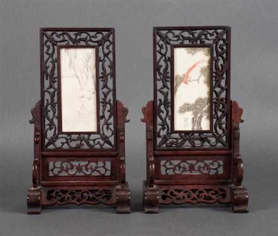 Appraisal: Two Chinese carved wood and painted ivory table screens carved