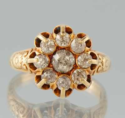 Appraisal: A Ladies' Diamond Cluster Ring k yellow gold ring with