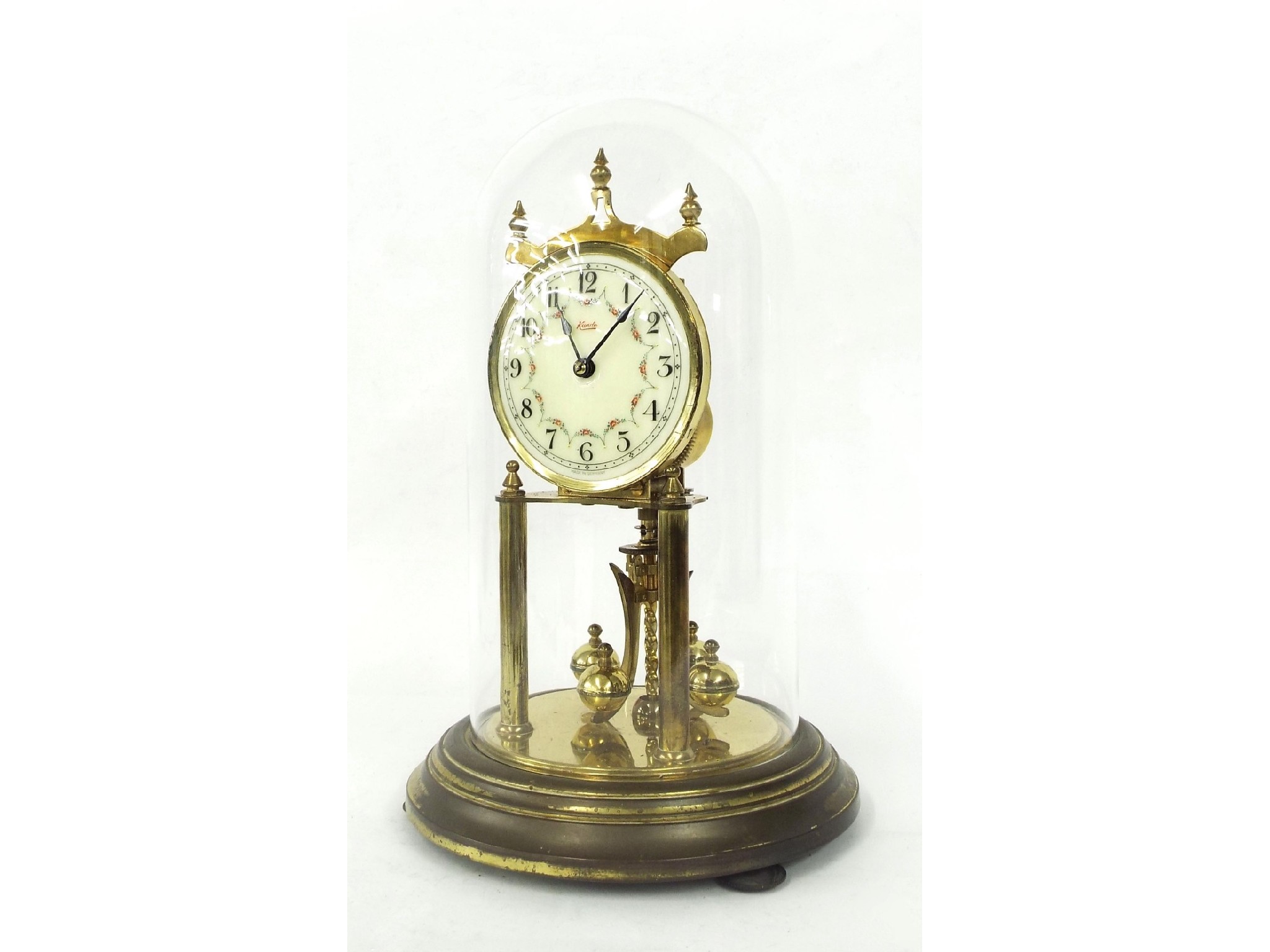 Appraisal: Kundo torsion clock the dial upon brass supports and a