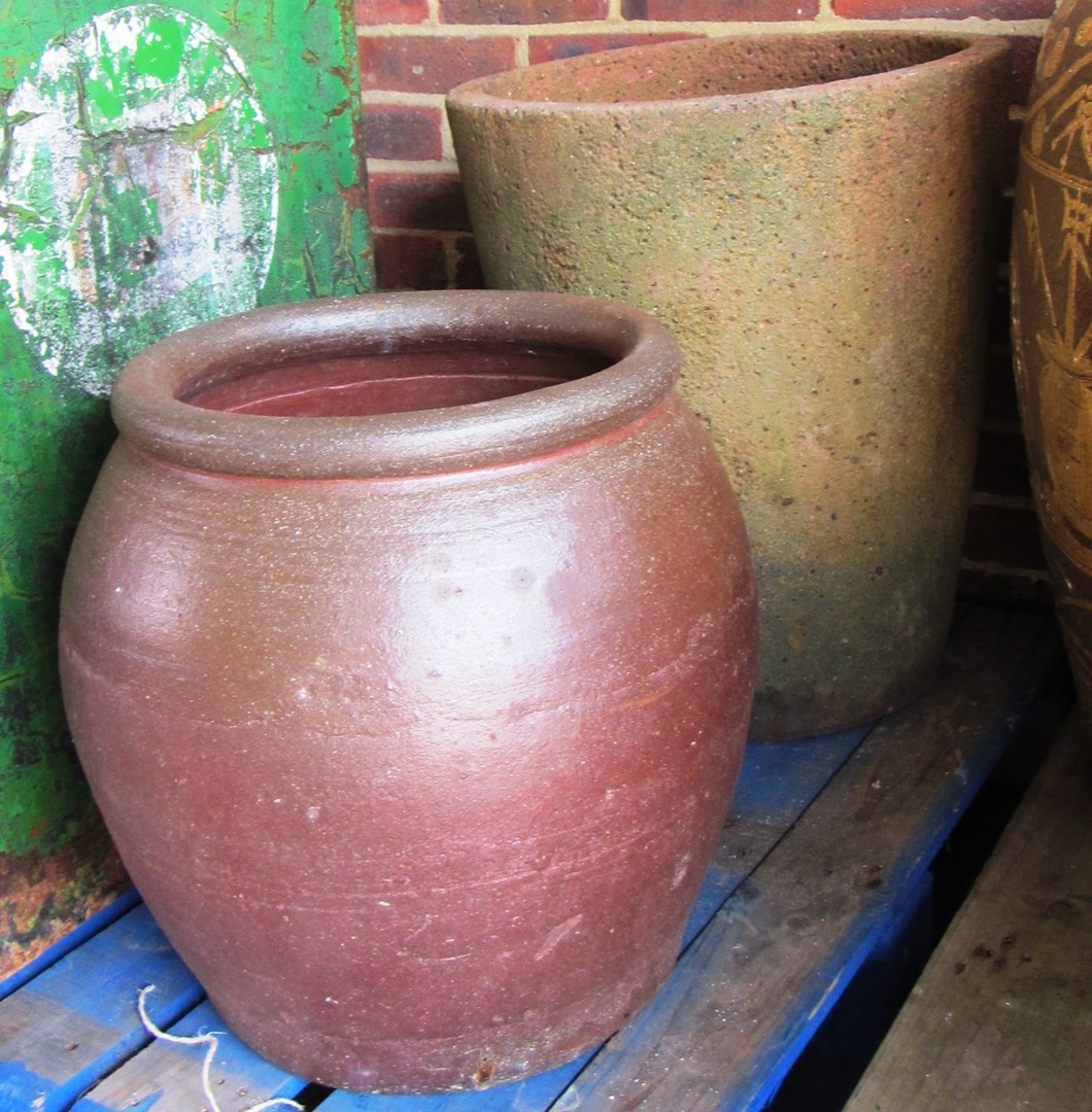 Appraisal: Two various terracotta garden pots the largest cm high