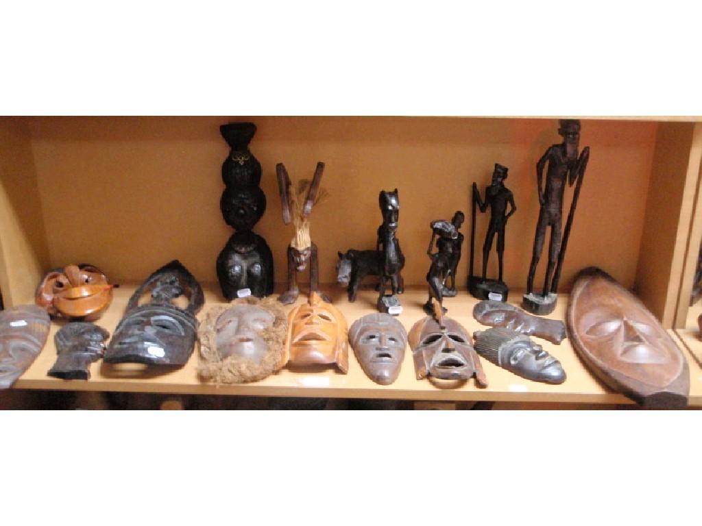 Appraisal: A collection of African tribal carved hardwood face masks and