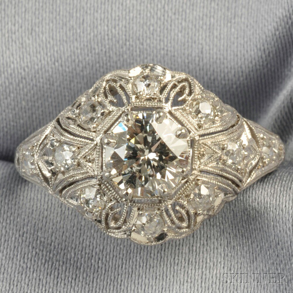 Appraisal: Platinum and Diamond Ring set with a full-cut diamond weighing