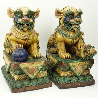 Appraisal: Pair of Large Chinese Polychrome Pottery Foo Dogs Heavily detailed