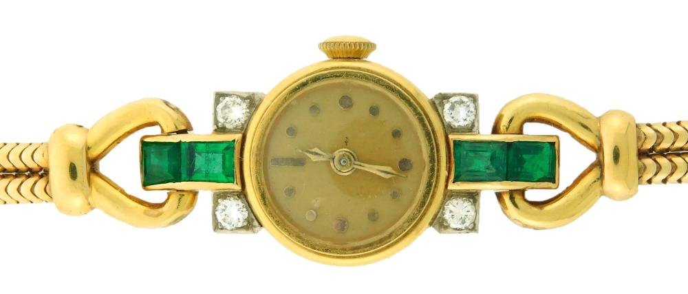 Appraisal: JEWELRY Woman's K Mido diamond emerald wristwatch manual wind movement