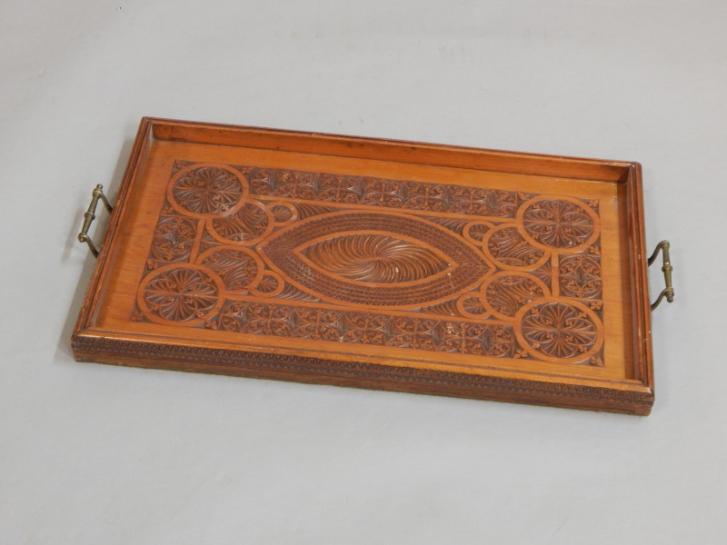 Appraisal: An Indian carved teak tray with two brass handles cm