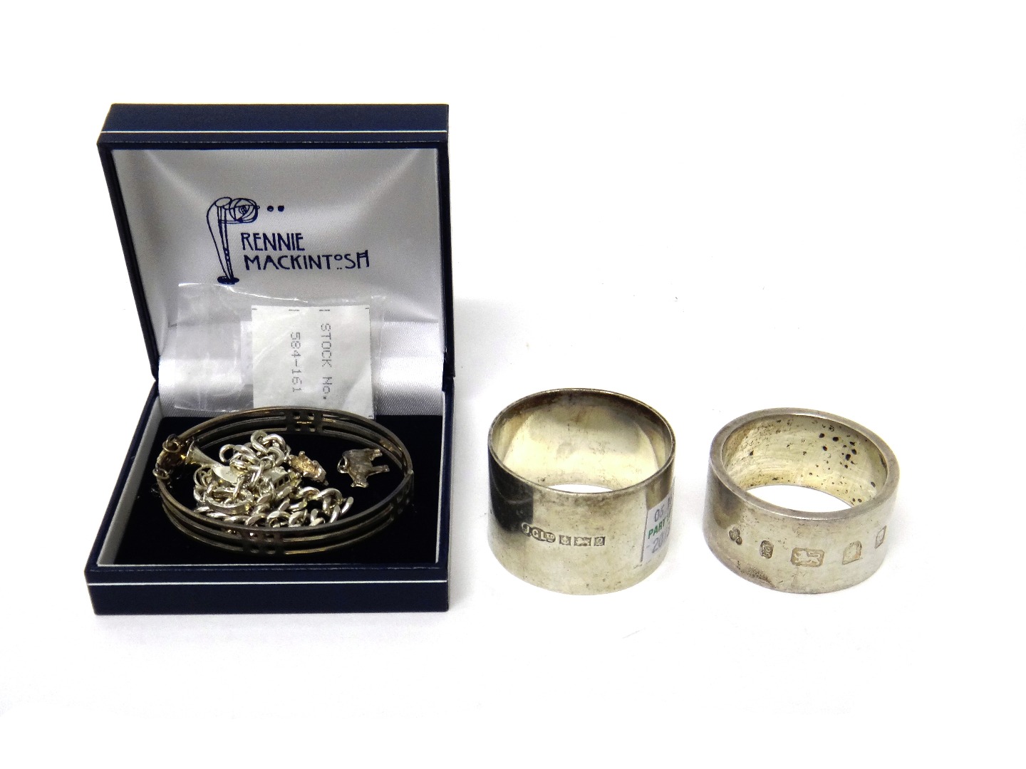 Appraisal: Silver comprising two napkin rings including Birmingham an oval hinged