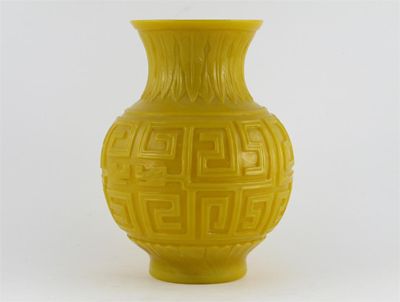 Appraisal: A Chinese yellow glass vase carved with a wide band