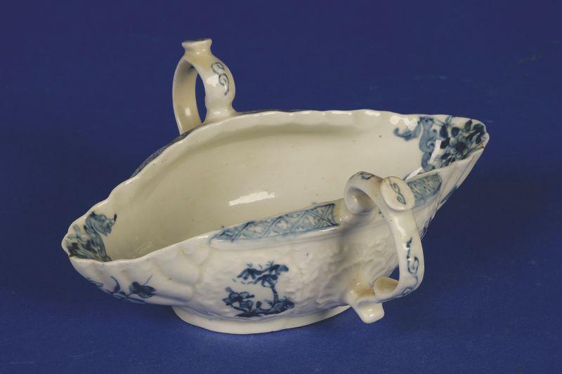 Appraisal: A FIRST PERIOD WORCESTER BLUE AND WHITE TWO HANDLE SAUCE