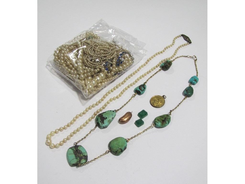 Appraisal: Lot comprising a turquoise spacer necklace a graduated string of