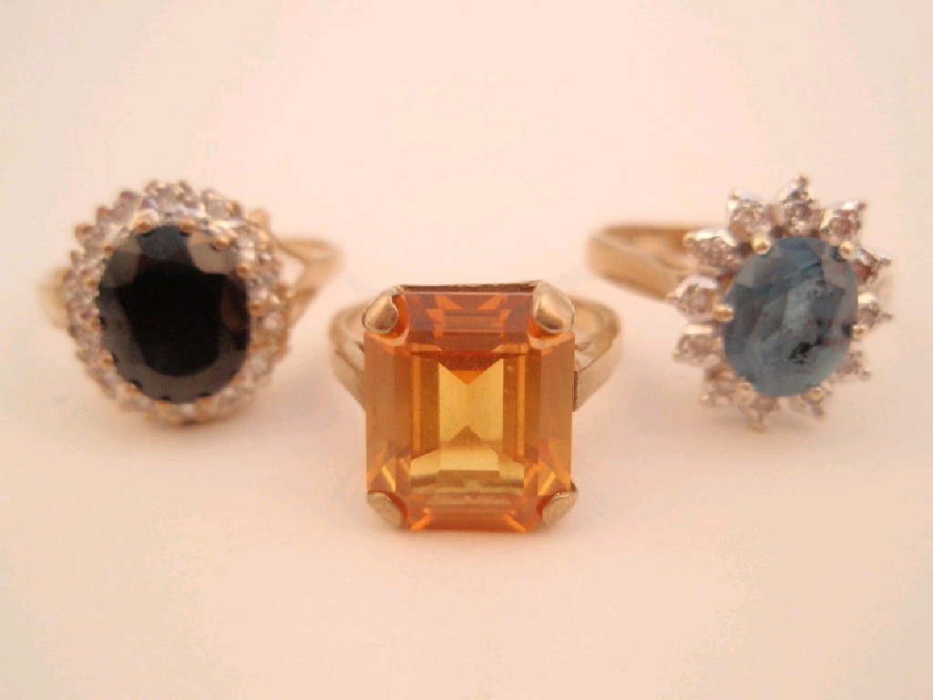 Appraisal: Three ct gold gem set dress rings