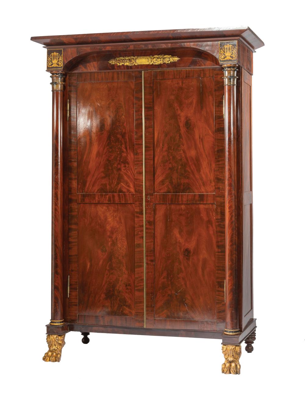 Appraisal: American Classical Carved Gilded and Stenciled Mahogany Armoire early th