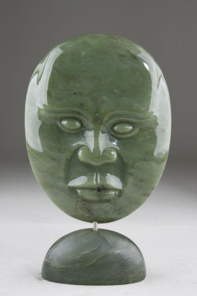 Appraisal: Carved Jade Mask early th c with pedestal base of