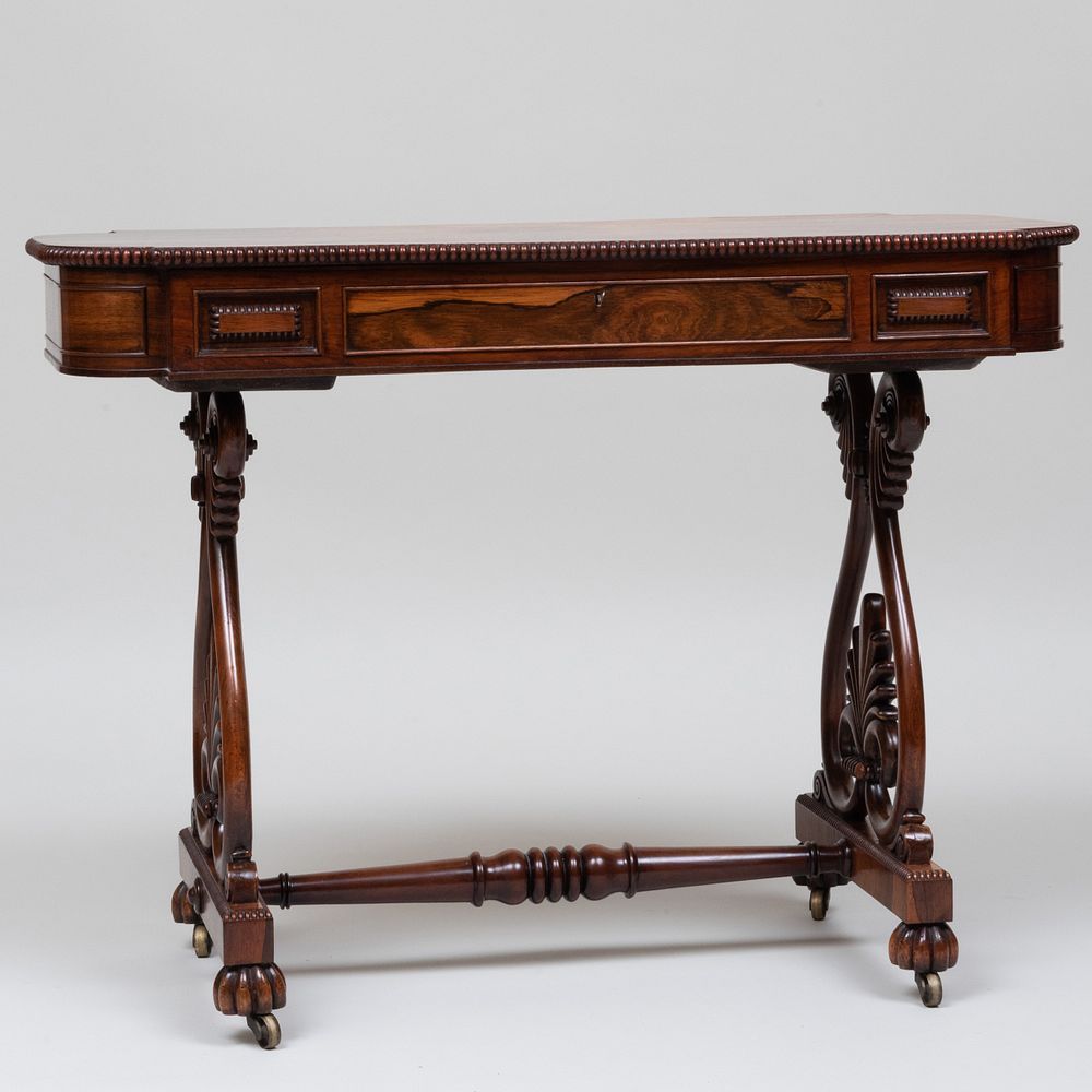 Appraisal: Late Regency Carved Rosewood Writing Table Fitted with one drawer