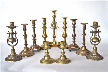 Appraisal: Group of four pairs of brass candlesticks th and th