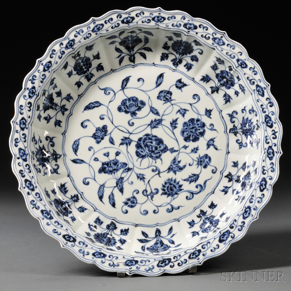 Appraisal: Large Blue and White Ming-style Dish China twelve-fluted shape decorated