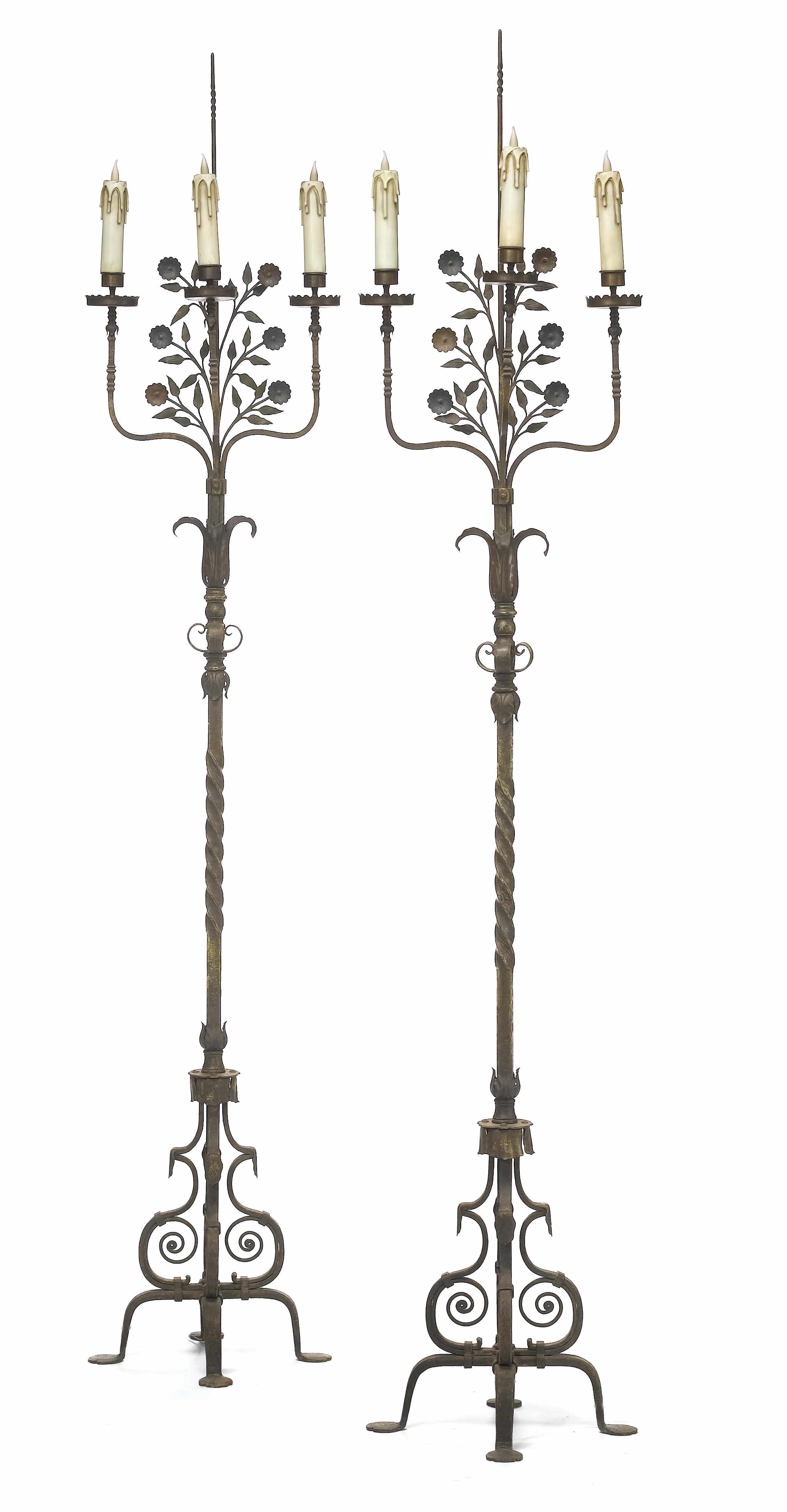 Appraisal: A pair of Renaissance Revival cast iron three light floor