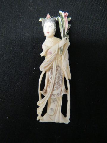 Appraisal: Chinese Carved Ivory Figurine of a Lady fancy polychrome