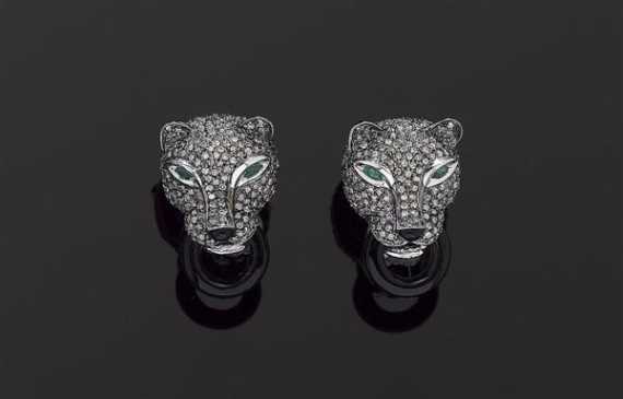 Appraisal: DIAMOND AND ONYX CLIP EARRINGS White gold Decorative elegant clip