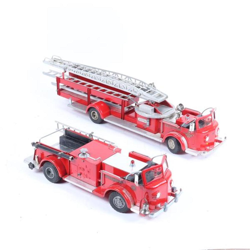 Appraisal: TWO MODEL RED PRESSED STEEL TOY ROSSMOYNE FIRETRUCKS LARGE WITH