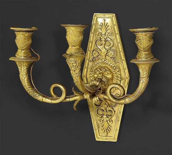 Appraisal: PAIR OF MATTE AND POLISHED GILT BRONZE APPLIQUES AUX TETES