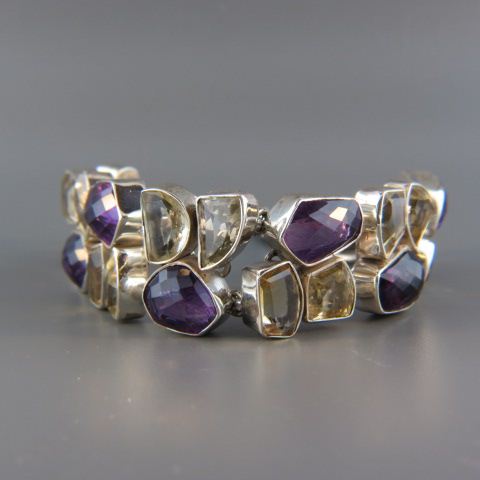 Appraisal: Amethyst Citrine Bracelet rich gems in various shapes totaling over