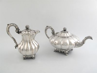 Appraisal: An early th century Canadian teapot and matching hot milk