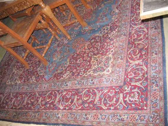 Appraisal: KESHAN old Light blue ground with red corner motifs and