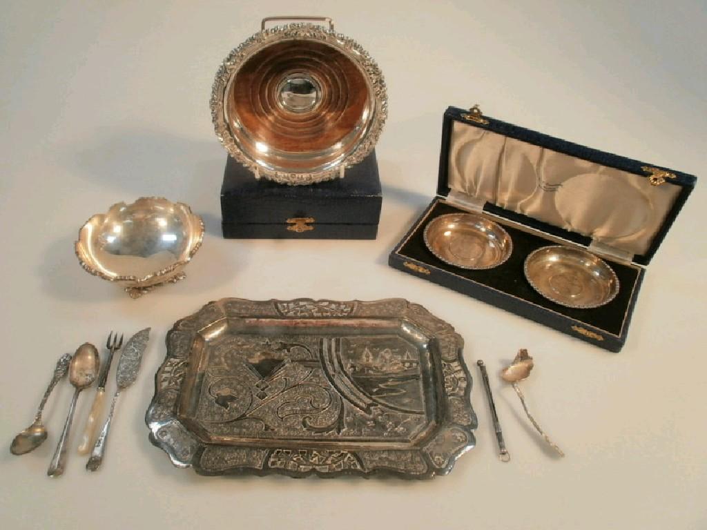 Appraisal: Silver plated wine coaster an Indian silver tray with pierced